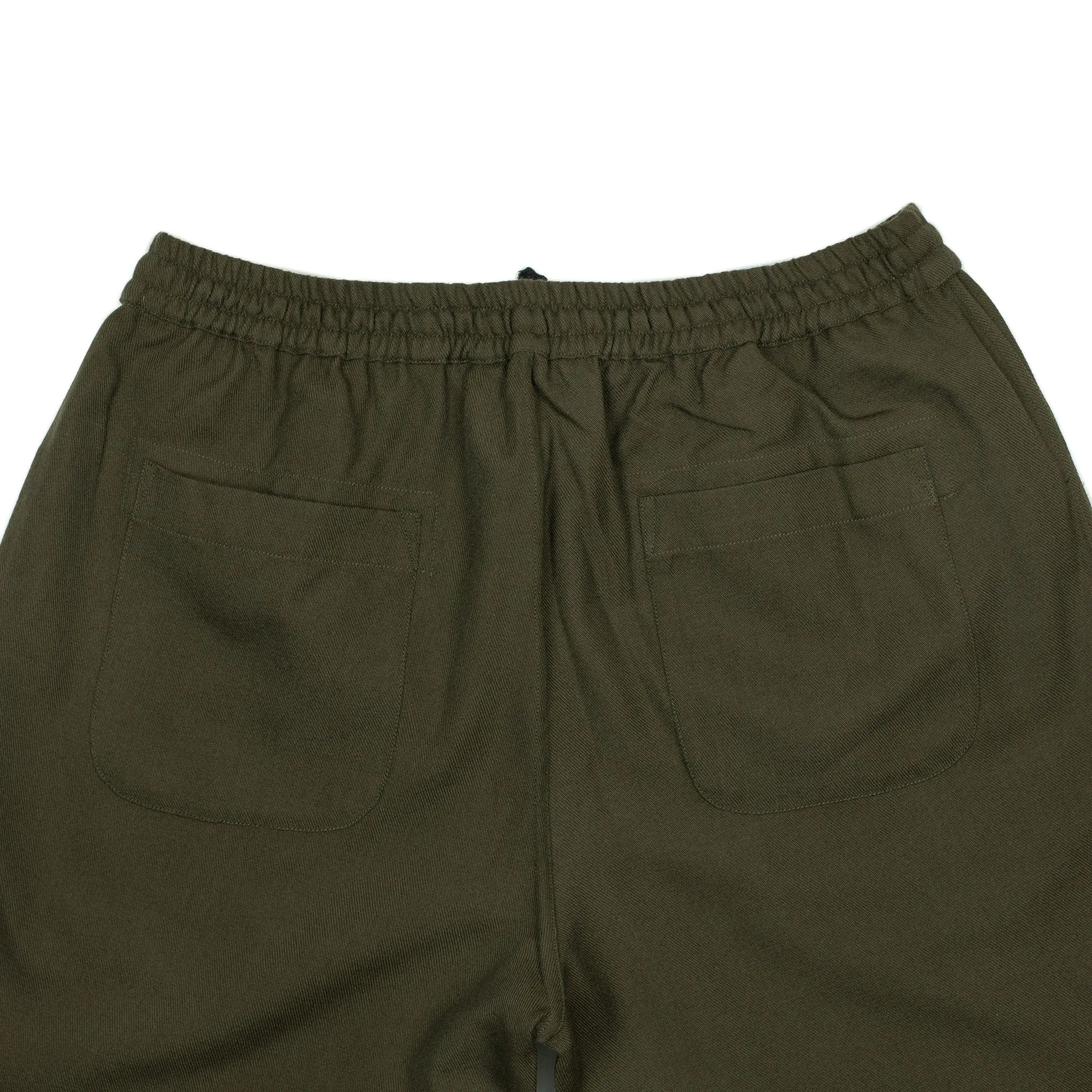 Drawstring trousers in forest green wool gabardine