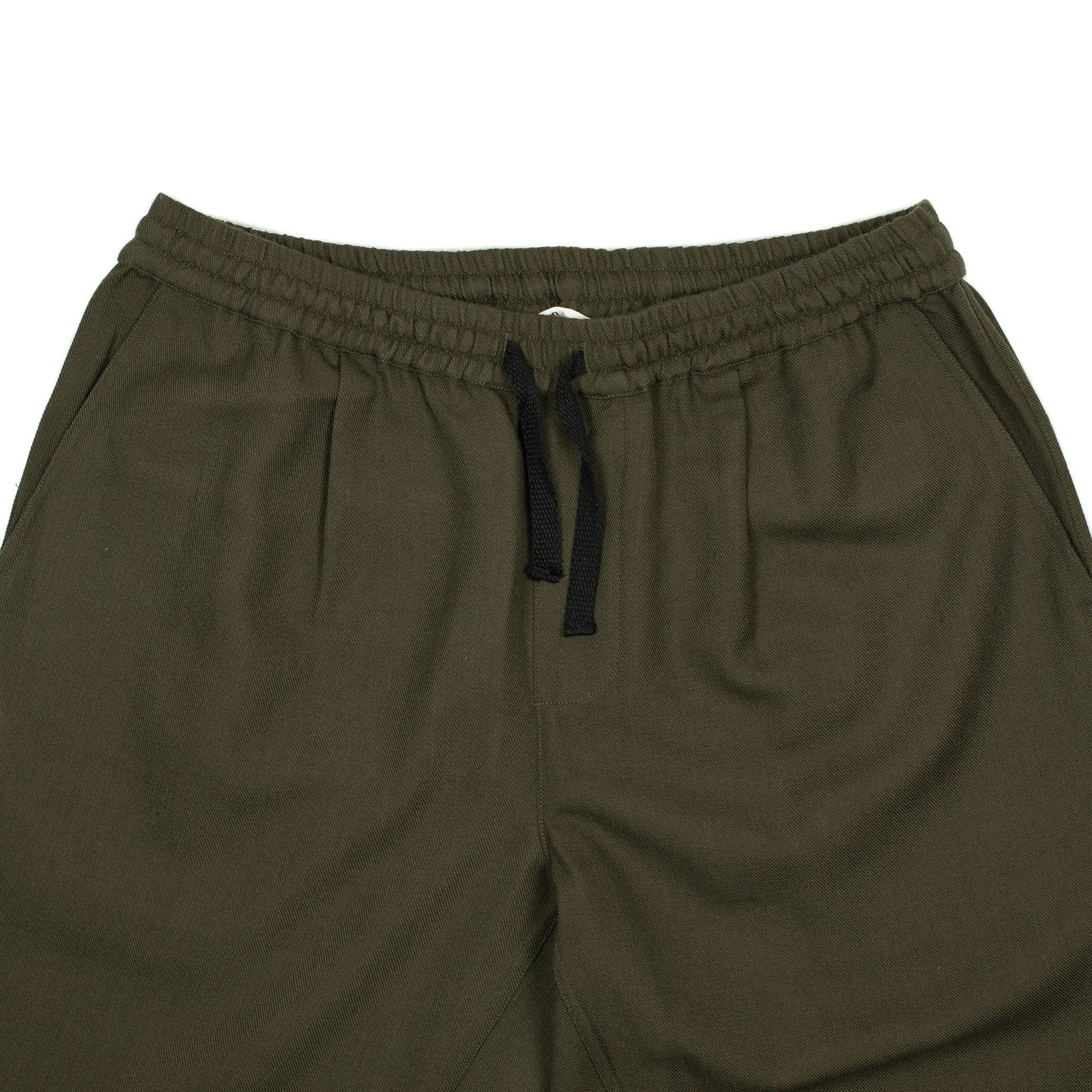 Drawstring trousers in forest green wool gabardine