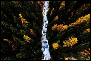 Snow River In Mountains